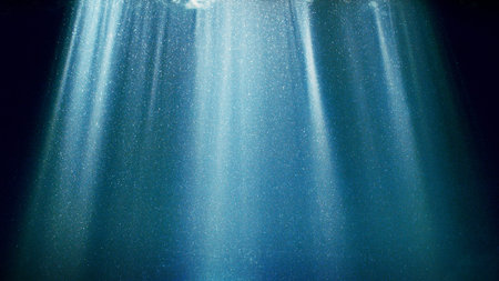 Dark Blue Ocean Surface Seen from Underwater. Abstract Waves and Rays of Sunlight Shining Throughの写真素材