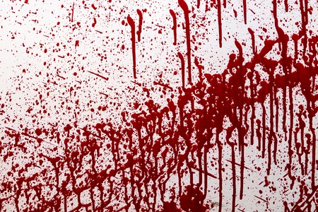 stained red paint, similar to the blood on a white background.の写真素材
