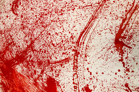 stained red paint, similar to the blood on a white background.の写真素材