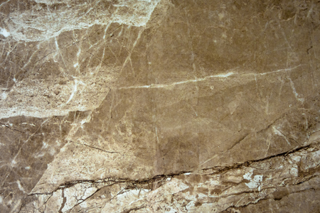 The texture of the marble is a green-brown shade.の写真素材