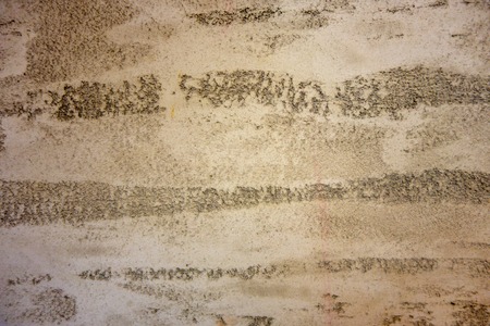 Texture of a fragment of a wall of a modern structure of white color. Harshness in the style of bark beetle.A background for design and creative work. Decoration and exterior decoration of the buildの写真素材