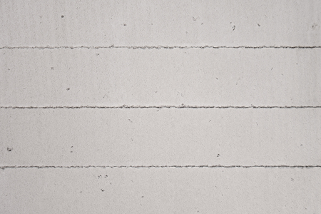 Creative background of foamed structural concrete. Wall of foam concrete.の写真素材