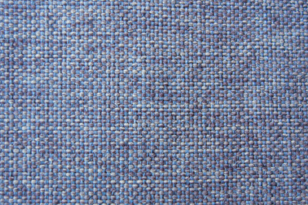 blue linen textile - close up of fashion background.