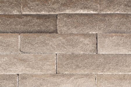 Brick wall of brown brick. Creative vintage background