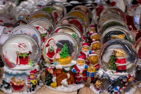 Glass snow globe with Santa on a store shelf. 2019.04.12. Odessa. Ukraine.のeditorial素材