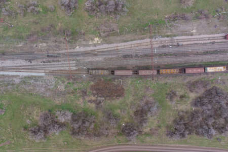 Railway station and trains top view. Photo from a helicopterの写真素材