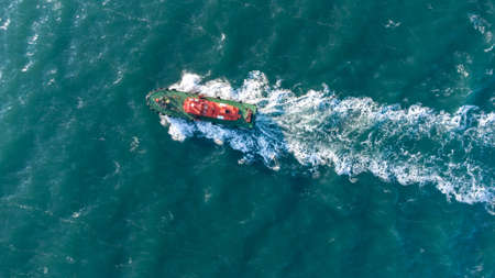 up view of sea water and boat in summerの写真素材
