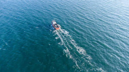 up view of sea water and boat in summerの写真素材