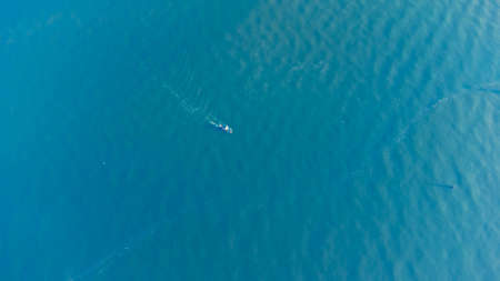 up view of sea water and boat in summerの写真素材