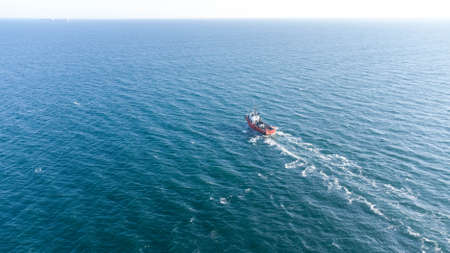 up view of sea water and boat in summerの写真素材