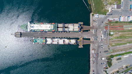 Two sea ferries at the pier during the loading period. aerial view. Dry cargo ro-roの写真素材