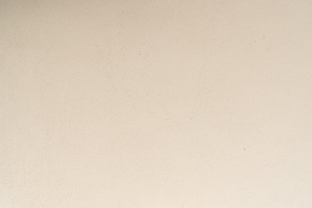 Structural plaster in beige color. creative vintage backgroundの写真素材