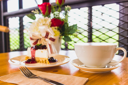 Morning coffee with Blueberry Cheese pie ready for the day.の写真素材