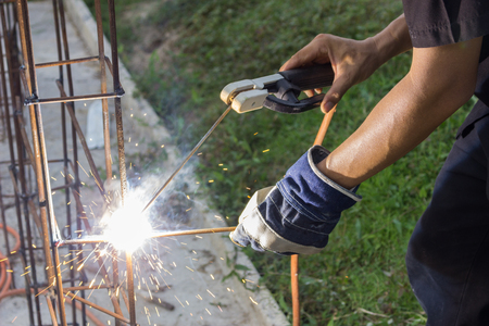 Man welded steel structure, Protective glovesの写真素材