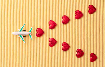 airplane model on yellow background, travel conceptの写真素材