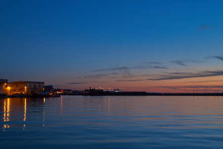 sunset over the dam wingの写真素材