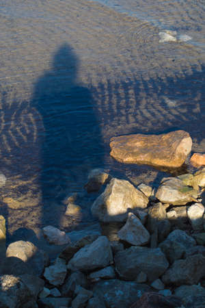 shadow between the rocks, bibione coast, Veniceの写真素材