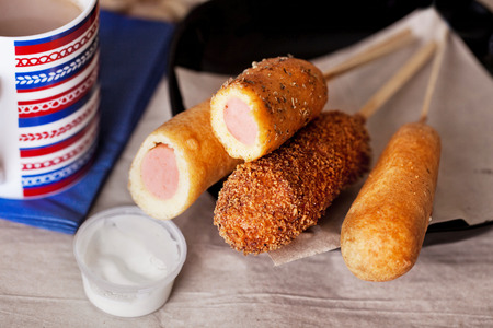 korndog with french fries and ketchup in a still lifeの写真素材