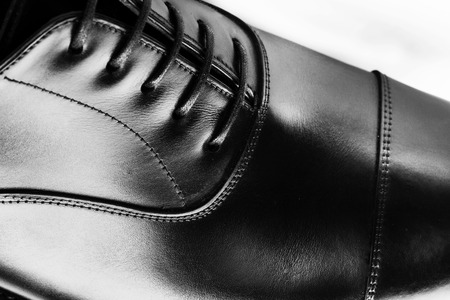 business woman in glasses with a tablet in the windowの写真素材