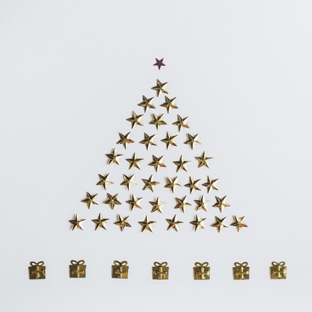 New Years composition. Christmas tree of spangles in the form of stars. Beautiful greeting card. Top viewの写真素材