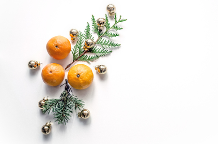 New Year composition with mandarins on a white background. Christmas background for presentation of work or text. Beautiful greeting card.の写真素材