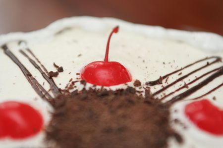 Chocolate dessert with a cherry