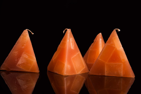 Christmas candles on a black backgroundの写真素材