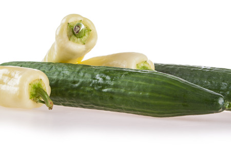 cucumber and peppers numbering on a white backgroundの写真素材