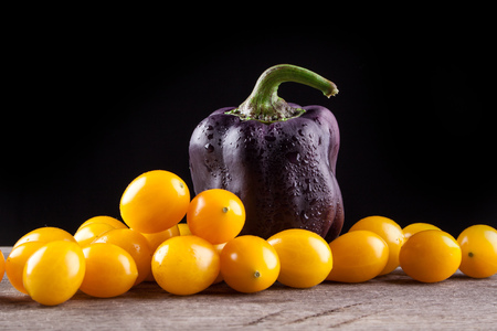vegetables on a black background, peppers, tomatoesの写真素材