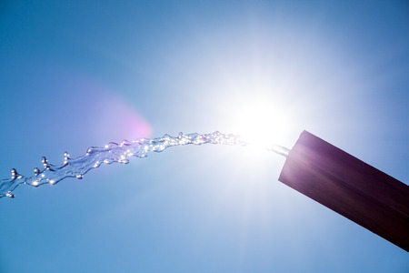 splashing water at the water fountainの写真素材