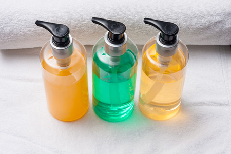 towel roll and pump bottles.の写真素材