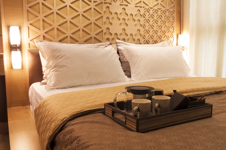 luxury bedroom with tea set.の写真素材