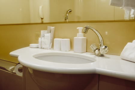 small sink with white restroom utensils.の写真素材