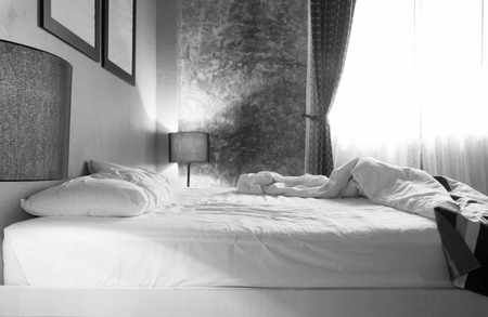 woke up in the morning and unmade bed.の写真素材
