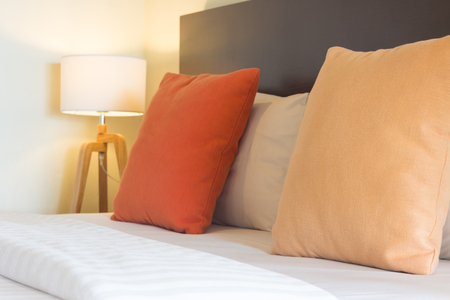 comfortable bedroom decorated with wood furniture.の写真素材