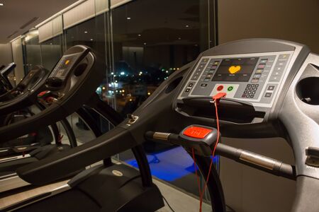 treadmill ready for customer in 24 hour gym.