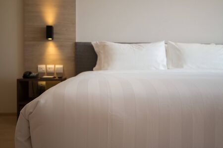 Modern interior hotel bed room ,focus on foreground bed. blurred backgroundの写真素材