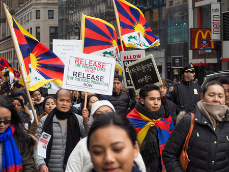 New York, NY/USA - March 10 2018: Tibetan protesters march in New York City on the annual Tibetan Uprising Day, commemorating the failed 1959 uprising against Chinaのeditorial素材