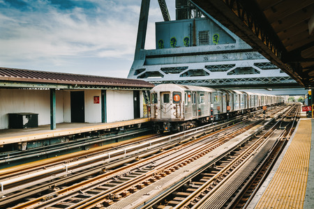 Bronx, NY/USA - May 24, 2015: Arriving MTA number 1 train at the 225th street station in the Bronx.のeditorial素材