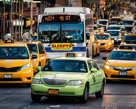 New York Ciity taxi cabs. Yellow (Medallion) and Green Appe (Boro)のeditorial素材