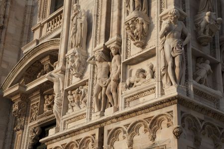 Figure on the main Facade of Duomo Cathedral Church in Milan; Italyの写真素材
