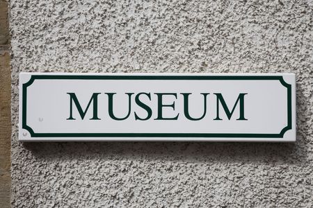 Museum Sign against Stone Wallの写真素材