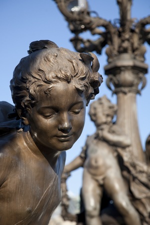 Figures on Alexandre III Bridge, Paris, Franceの写真素材