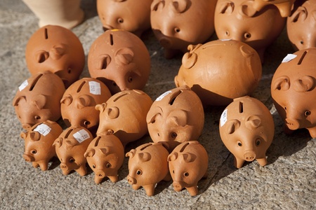 Piggy banks for sale in marketの写真素材
