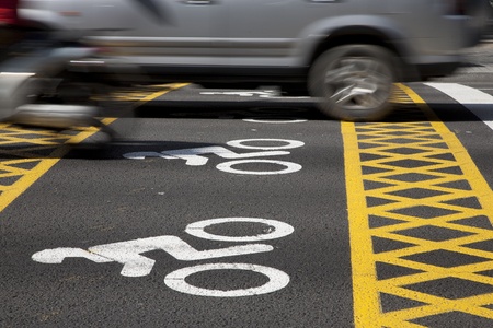 Motorbike preference symbol painted on street at traffic lightsの写真素材