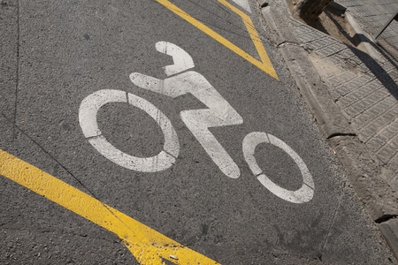 Motorbike Symbol on Street in Urban Setiingの写真素材