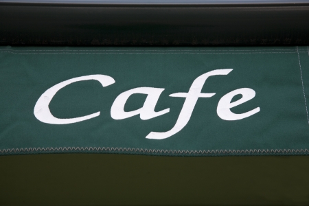 Green Cafe Sign on Shop Frontの写真素材