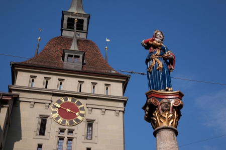 Statue of Anna Seiler Brunnen by Gieng 16th Century and Prison Tower, Bern, Switzerland, Europe