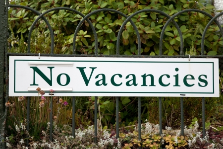 Green No Vacancies Sign in Rural Setting の写真素材