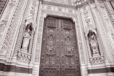 Detail on the Main Door and Facade Doumo Cathedral Church, Florence, Italy in Black and White Sepia Toneの写真素材